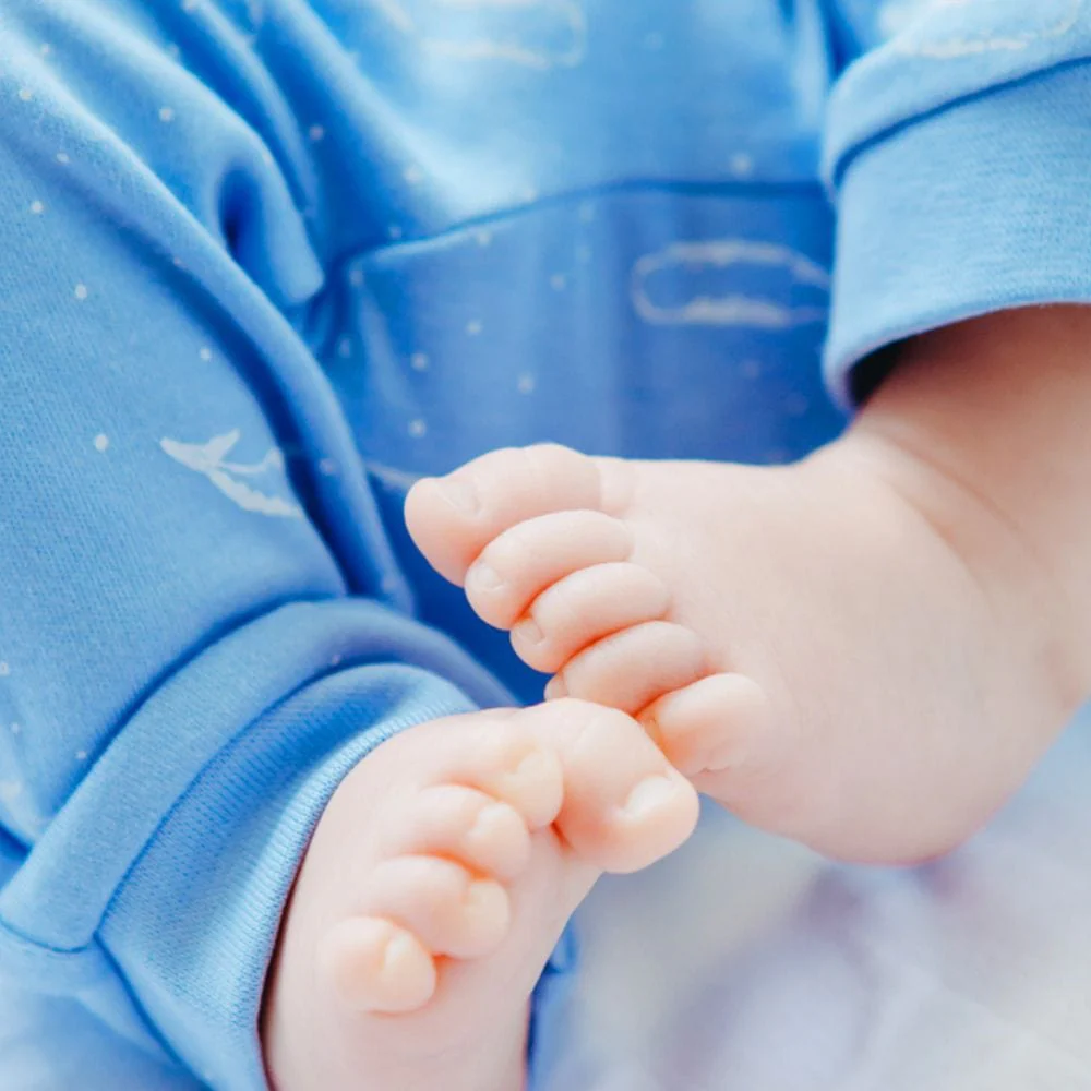 Organic Cotton Summer Short Sleeve Crossover Sleepsuit - Tiny Whales in Hydrangea Blue - Image 3
